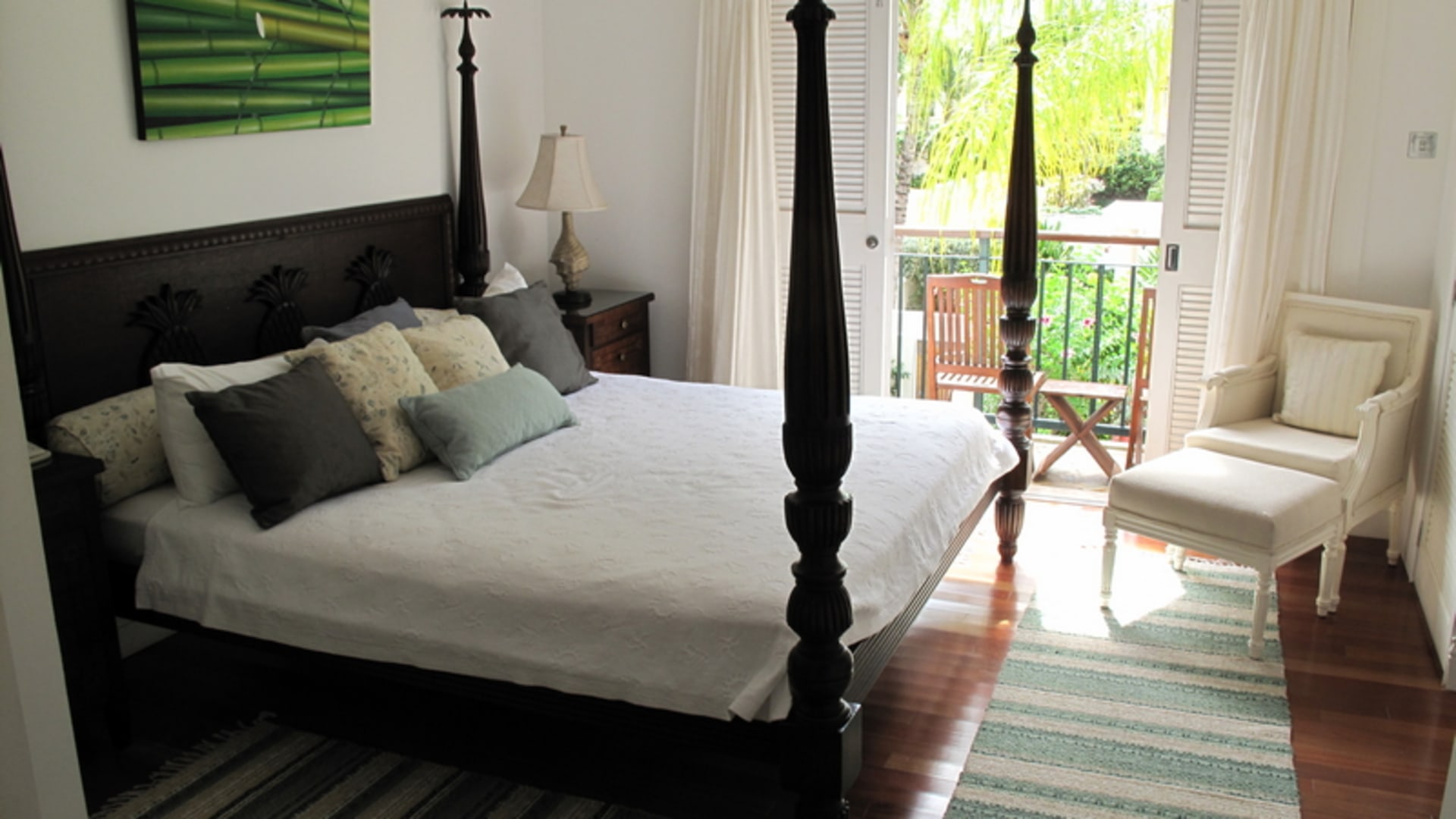 condo for sale at Cap Cove Unit 39 four poster bed