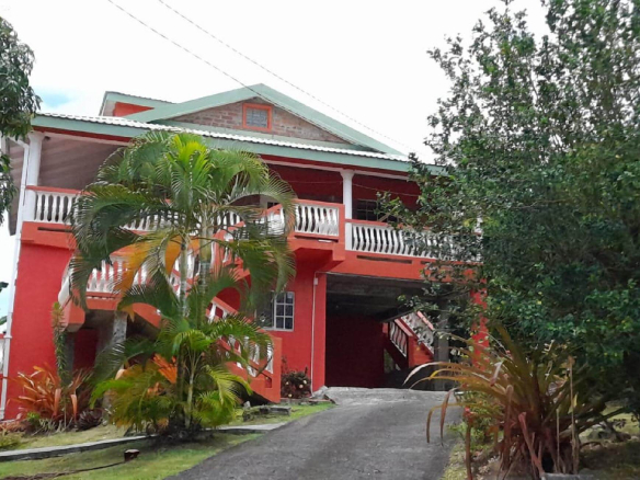 Experience the perfect blend of comfort and sophistication in this stunning red brick villa, beautifully nestled outside the serene town of Anse La Raye. Just a short 20-minute drive to the capital, this property is located in a coveted neighborhood that features a mix of high- to middle-income residences, making it a true gem in the heart of Saint Lucia.