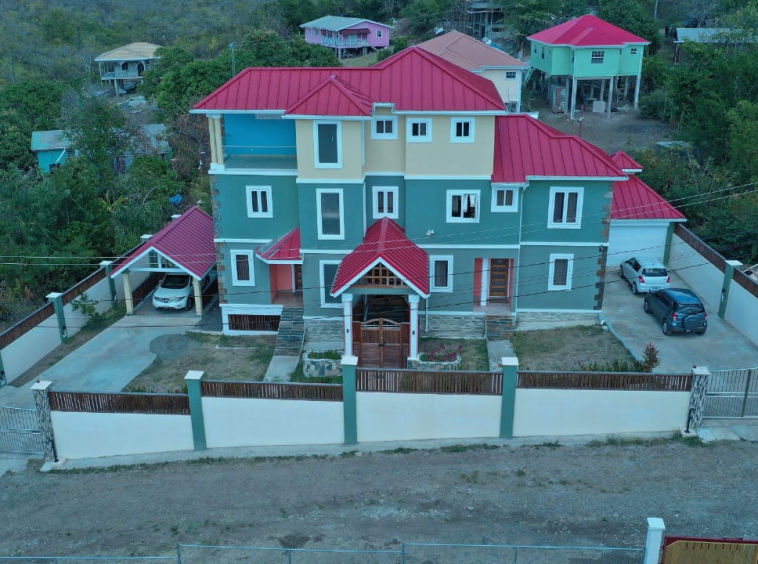 Tri-level villa for sale in Massade, Gros Islet with pool, rental units, and luxury finishes. Ideal for investment or upscale living in St. Lucia.
