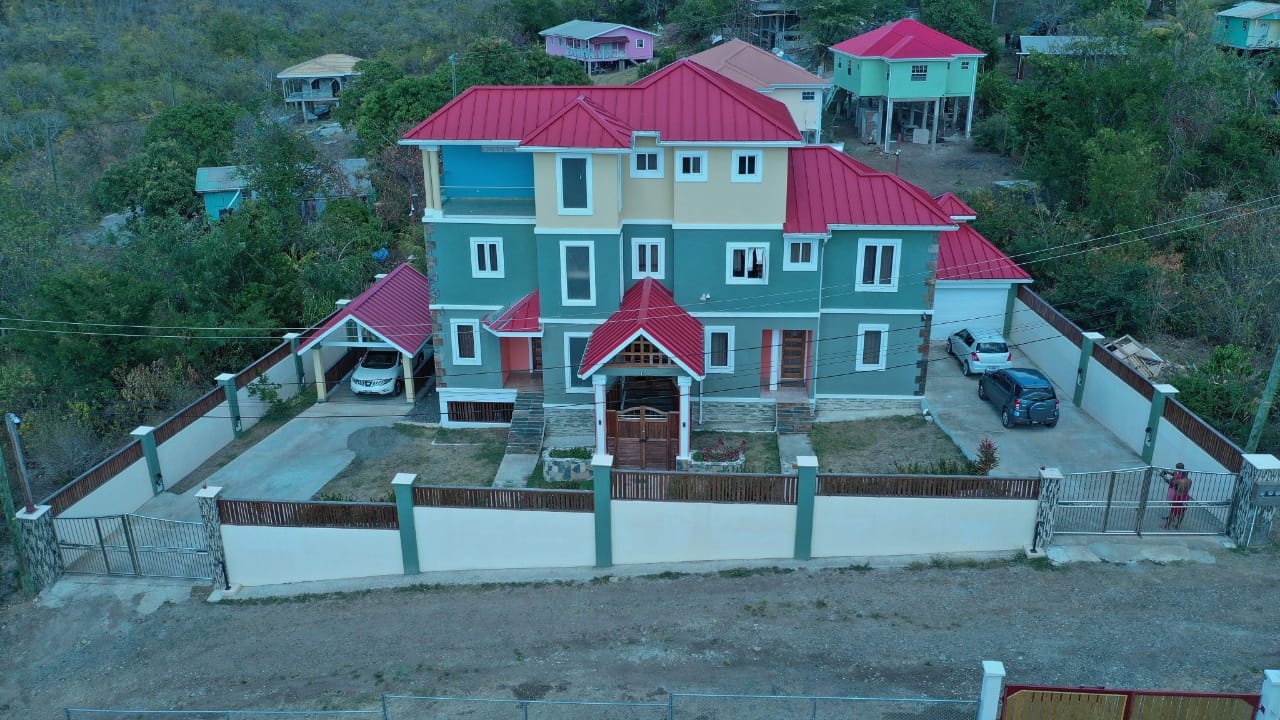 Tri-level villa for sale in Massade, Gros Islet with pool, rental units, and luxury finishes. Ideal for investment or upscale living in St. Lucia.